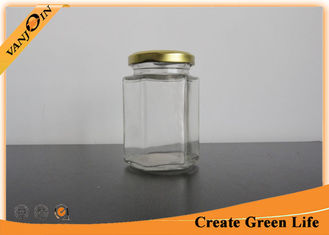 China Screwing Top 200ml Clear Glass Food Jars , Small Hexagon Glass Food Containers with Lids supplier