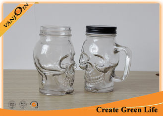 China Clear Skull Head 16oz Mason Glass Jar with Metal Screw Cap / Mason Jar Glasses With Handles supplier
