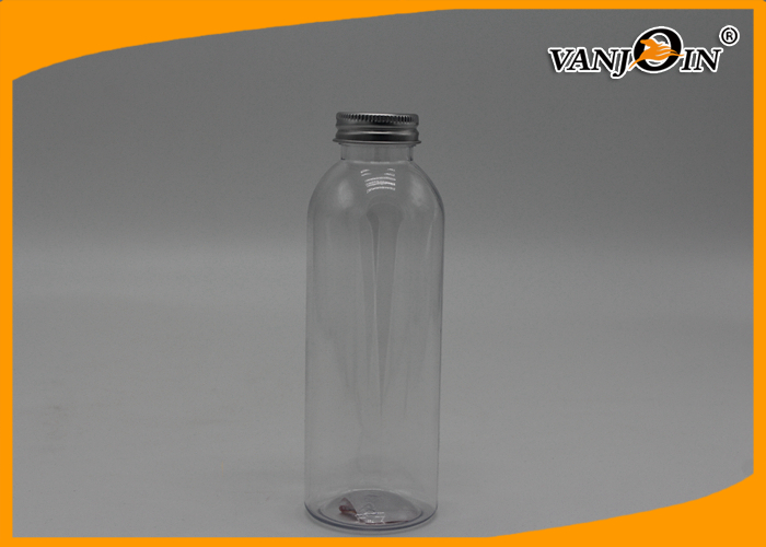 Fresh empty clear plastic juice bottles , recycling juice bottles plastic