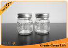 China 2oz Short Eco Mason Glass Jars With Silver Metal Lid , Clear Miniature Glass Bottles for Sauce company