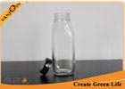 China Clear 10oz Decorative Glass French Square Bottles with Tamper Evident Cap for Milk factory