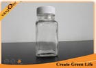 China 2oz Cute Unique Square Small Glass Bottles with lids , Plastic Cap Recycling Glass Drink Bottles factory