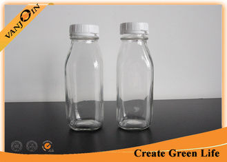 China Fruit Juice 10oz Clear French Square Glass Bottles With Plastic Tearing Off Ring supplier