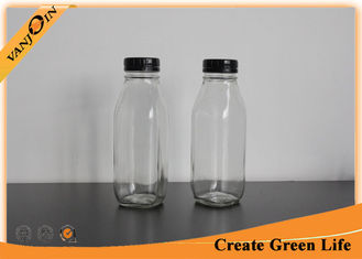 China Custom Empty Clear 16oz Square Glass Milk Bottles Wholesale With Tamper Evident Cap supplier