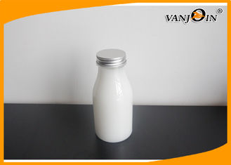 China Oval Round Transparent PET Plastic Juice Bottles with Screw Caps for Milk or Beverage supplier