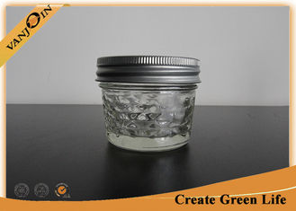 China Jam Storage Eco Mason Glass Jars With Lid And Band , 4oz Embossed Small Glass Jars supplier