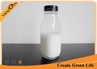 China Reusable Food Grade Glass Bottles for Milk , 8oz Glass Juice Bottles With Safety Sealing Cap supplier