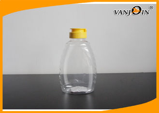 China 720ml BPA Free Transparent Plastic Food Jars for packing honey with squeeze cap supplier