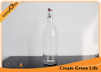 China Eco-friendly Recycled Glass Bottles Clear Round 1L Swing Top Glass Beverage Bottle With Lid supplier