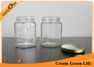 China Clear 180ml Hexagonal Glass Food Jars With Twist Lids For Canned Food , Jam , Honey supplier