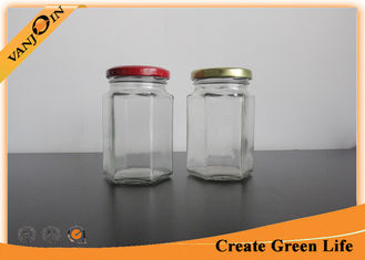 China Hexagon Shape 220ml Clear Food Glass Honey Jar , Reusable Small Glass Jars with Lids supplier