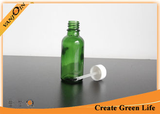 China Empty 30ml Green Essential Oil Glass Bottles Wholesale With Cap and Brush supplier