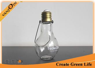 China New Design Hanging Light Bulb Glass Beverage Bottles With Metal Handle supplier