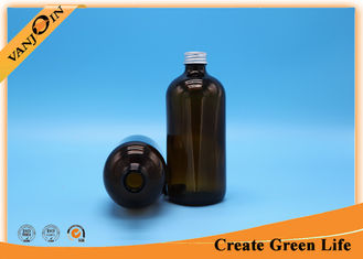 China 16oz amber glass bottles Boston Round  , Aluminum and Black Plastic Cap supplier