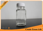 China 2oz Cute Unique Square Small Glass Bottles with lids , Plastic Cap Recycling Glass Drink Bottles factory