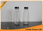 China Custom Empty Clear 16oz Square Glass Milk Bottles Wholesale With Tamper Evident Cap factory