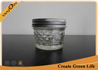 China Jam Storage Eco Mason Glass Jars With Lid And Band , 4oz Embossed Small Glass Jars factory