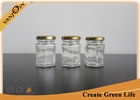 China Surface Handling 2oz 60ml Hexagonal Small Glass Food Jars With Lids / Lug Cap 43mm Dia factory