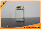 China Screwing Top 200ml Clear Glass Food Jars , Small Hexagon Glass Food Containers with Lids factory