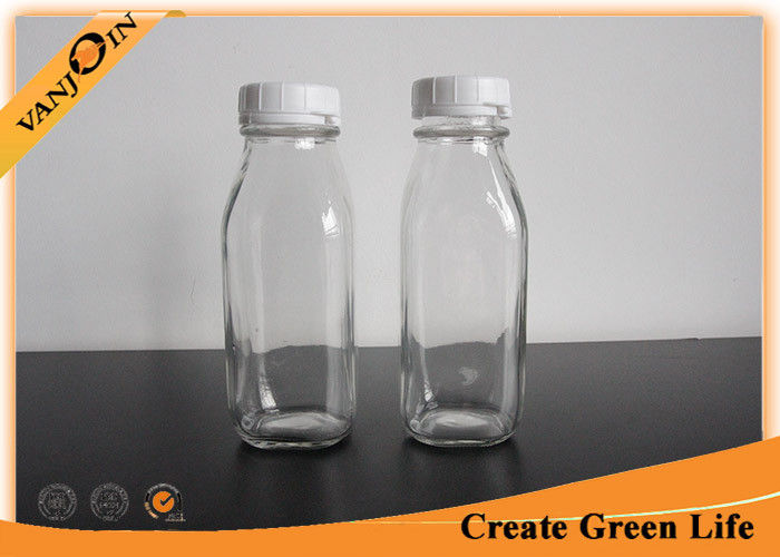 https://www.packaging-bottles.com/pl10414768-fruit_juice_10oz_clear_french_square_glass_bottles_with_plastic_tearing_off_ring.jpg